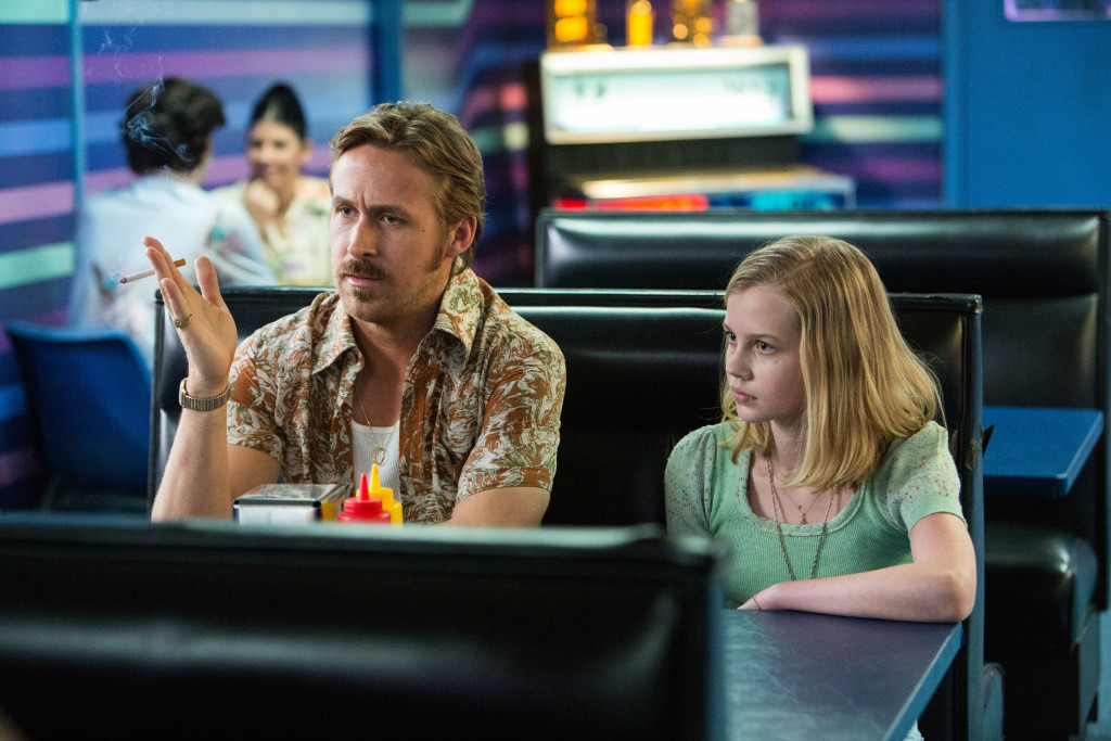 Ryan Gosling and Angourie Rice in THE NICE GUYS