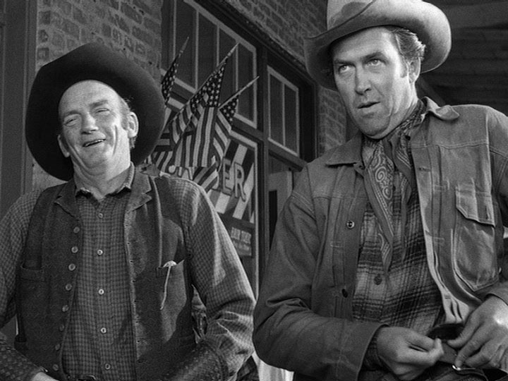 Millard Mitchell and James Stewart in WINCHESTER '73